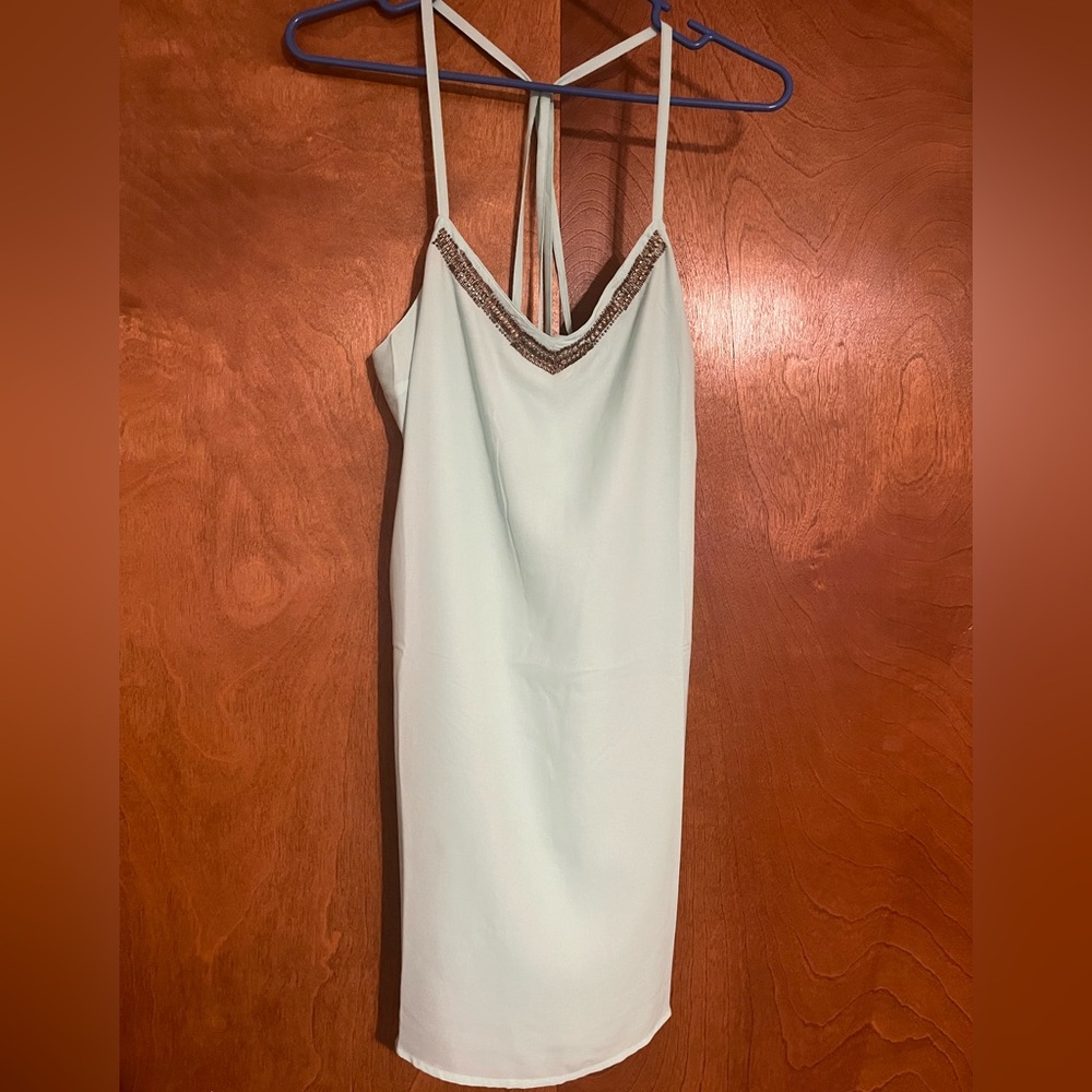 Elegant Light Green Dress with Beaded Neckline
